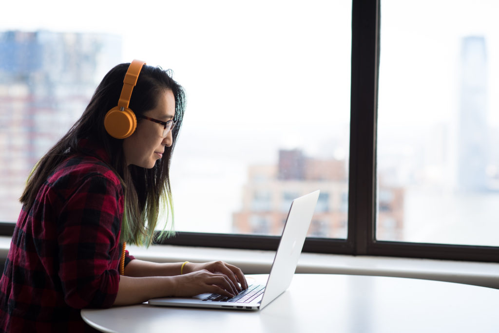 woman working from home showing sustainable practices